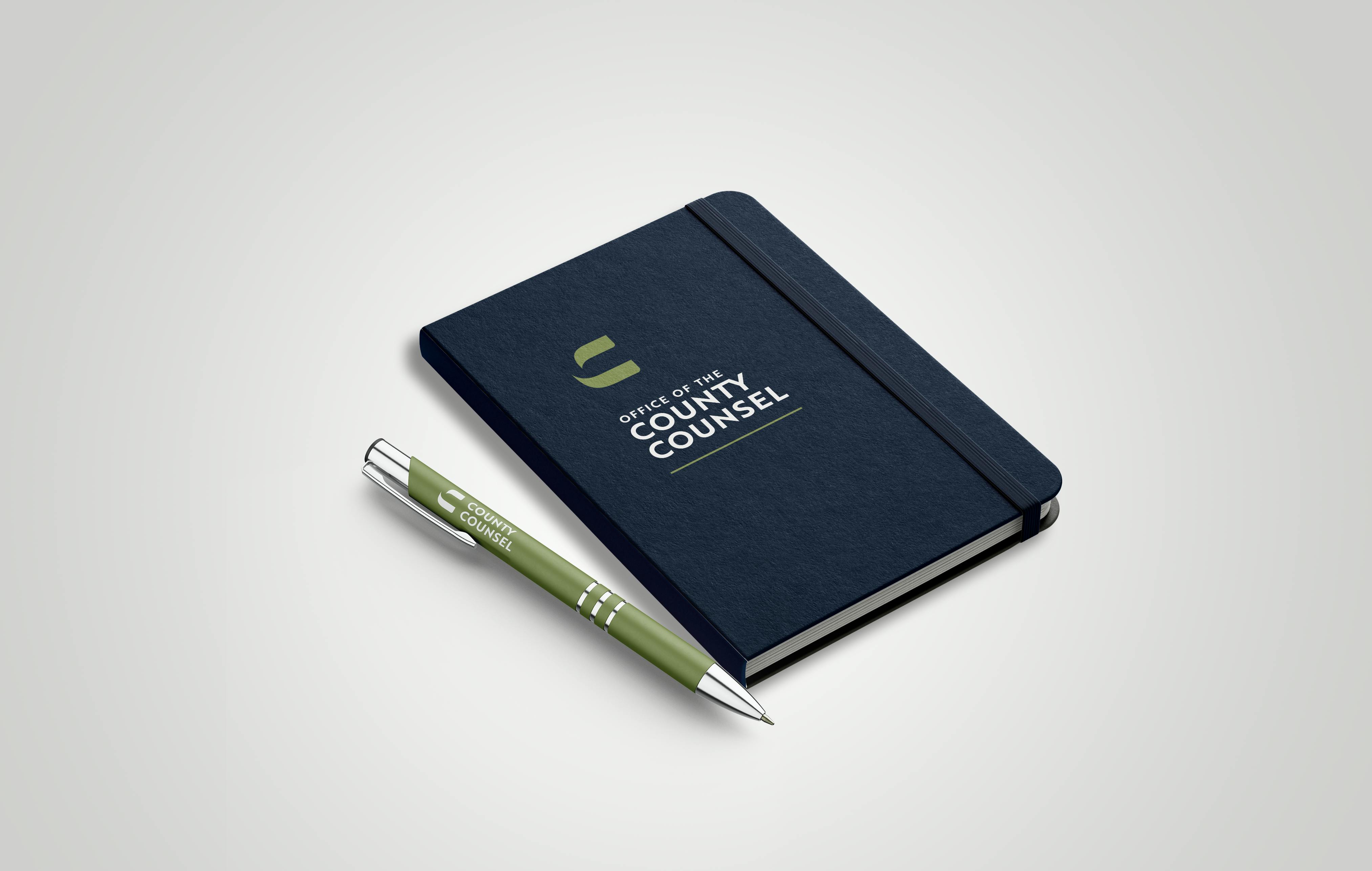 branded notebook and pen