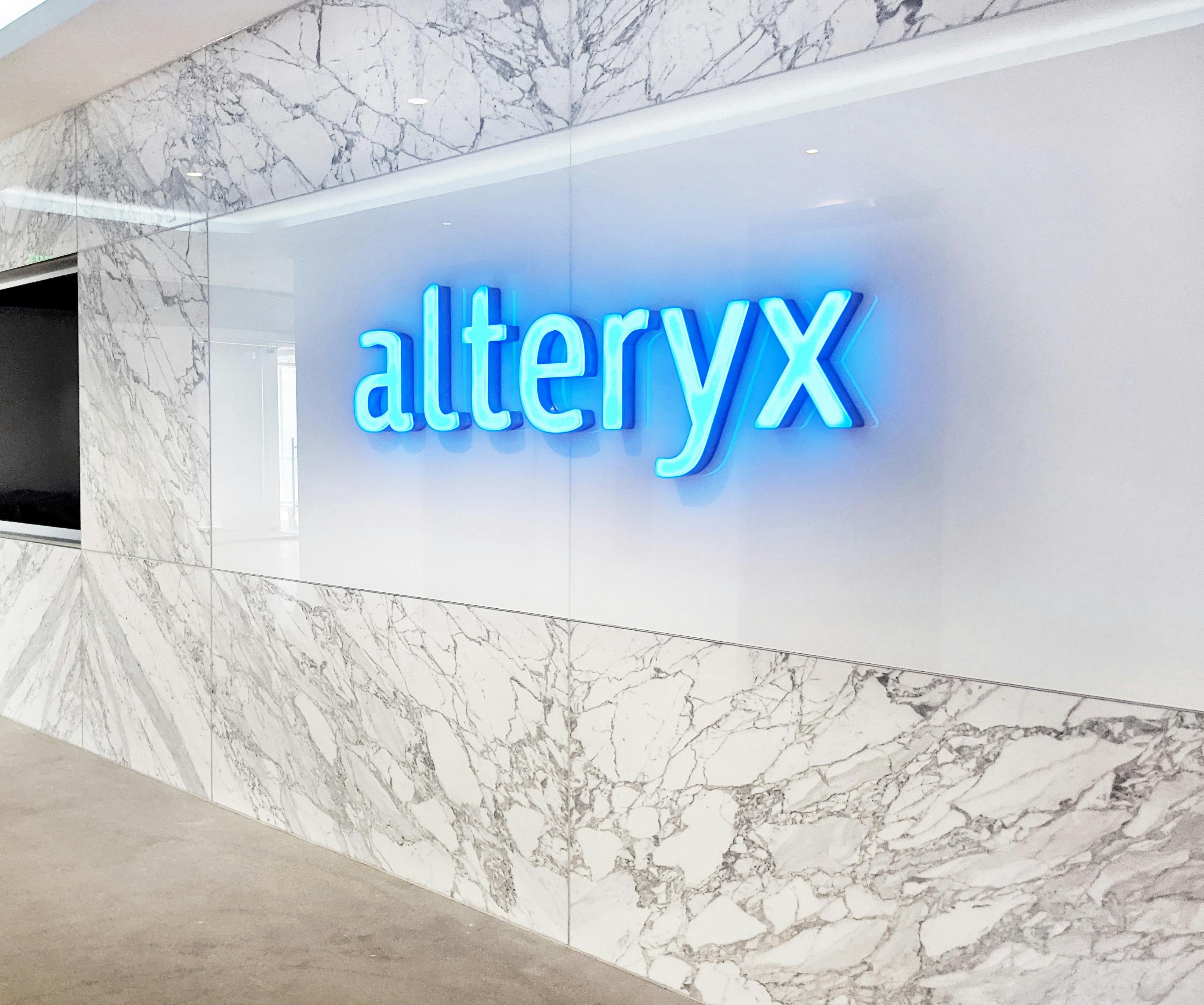alteryx glowing wall logo