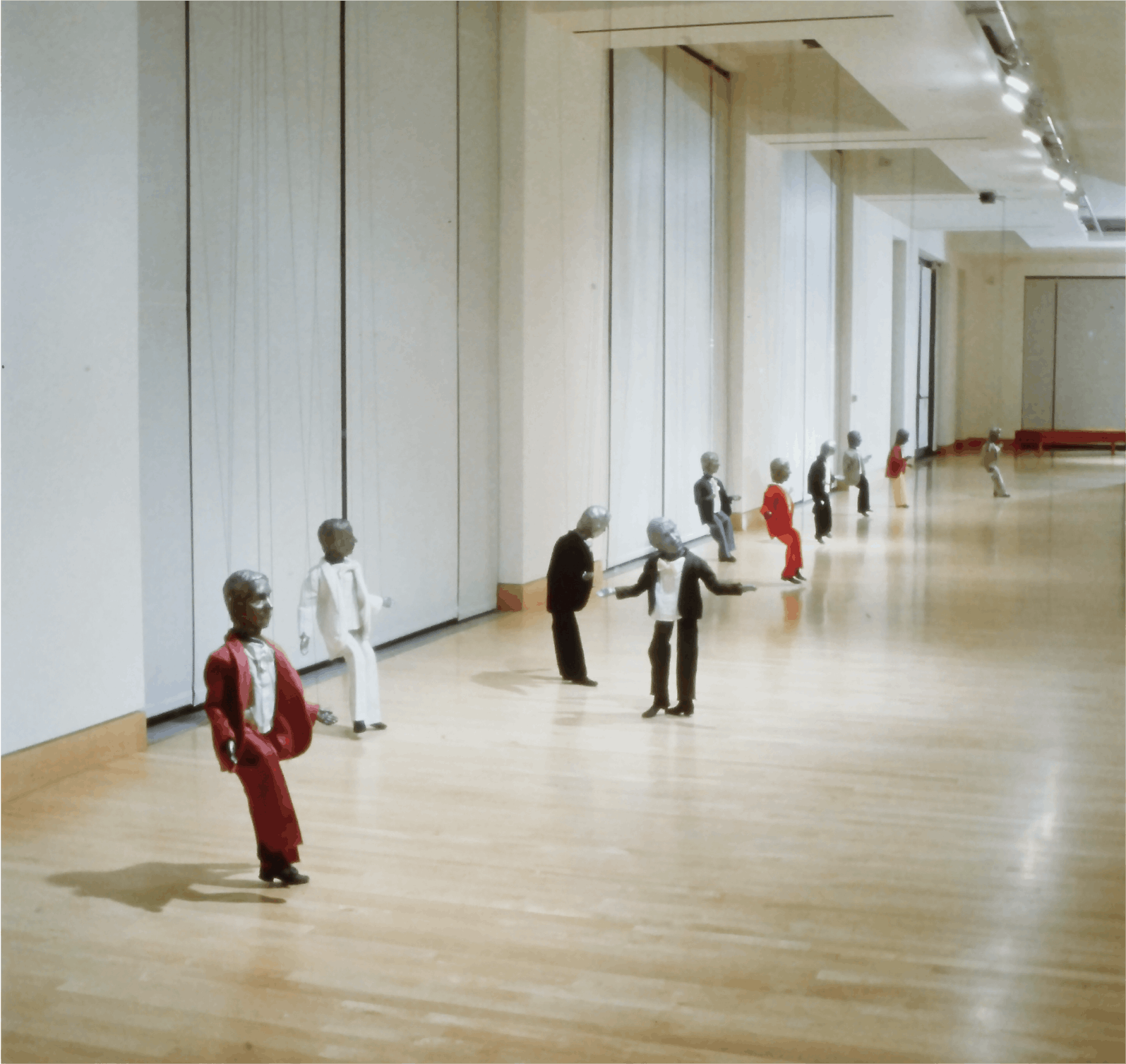 Dennis Oppenheim, Theme for a Major hit, 1974, Mechanized figures, felt, cotton, fishing line, soundtrack and spotlights, dimension vary 
