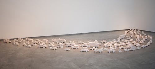 Graham, Susan. Beautiful Ohio at Lux Art Institute, 2012, Glazed porcelain vehicles, 15 x 7.5 feet
