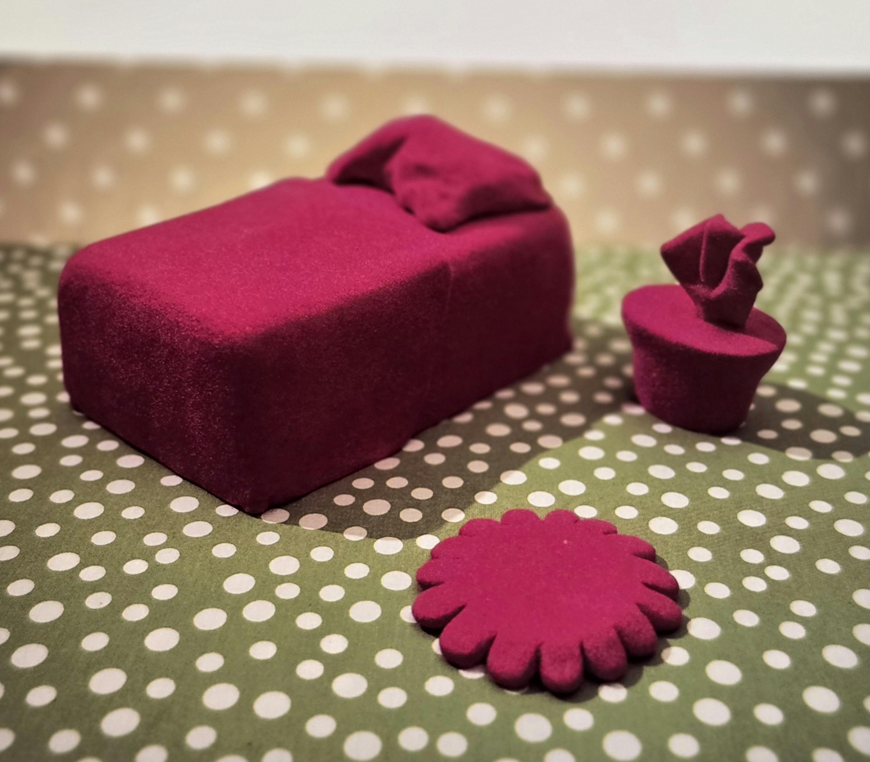 Untitled from Domestic_ The Set-ups (magenta), 1995, fired clay and flocking, 9 x 12 inches