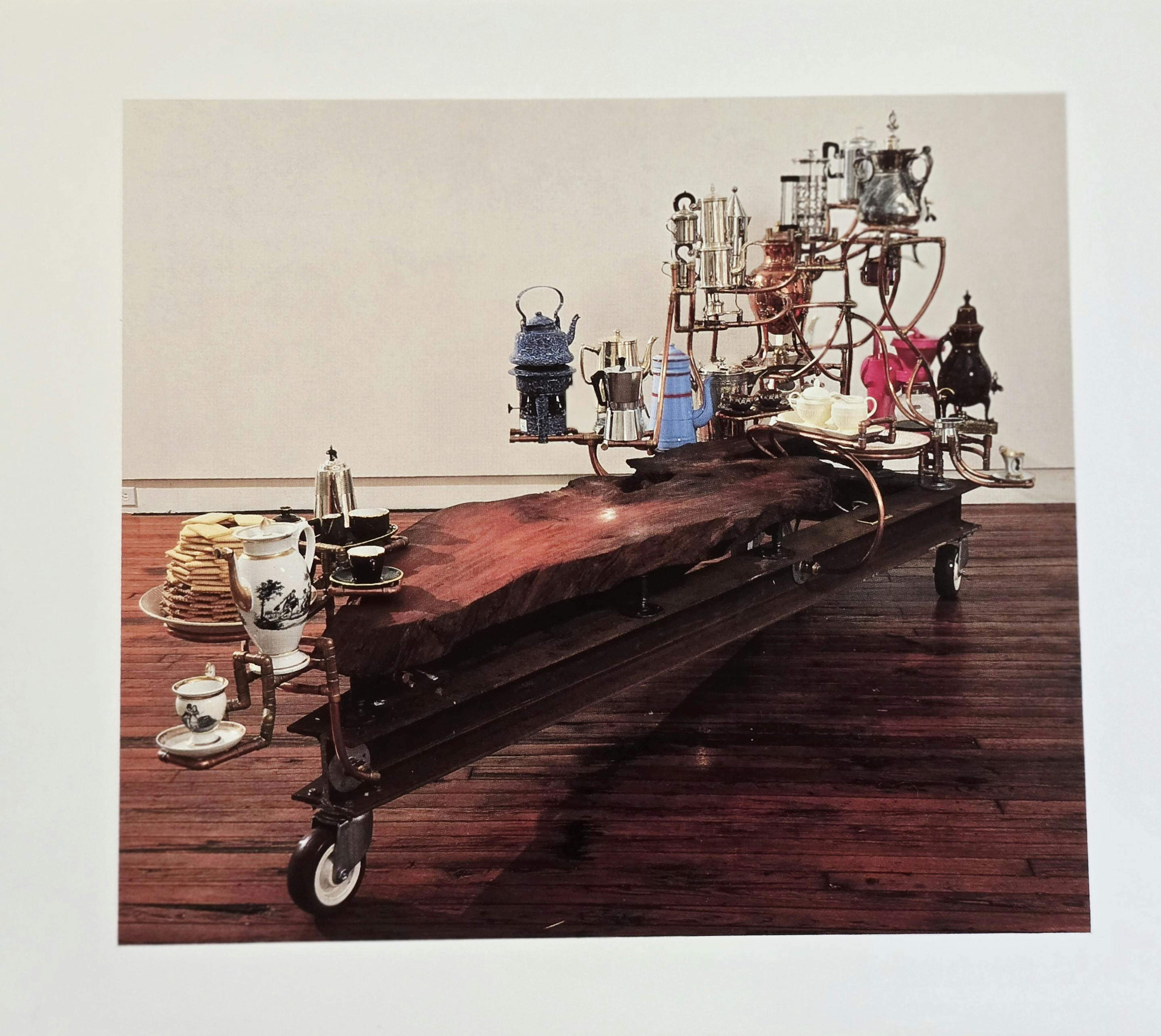 Joel Otterson, The coffee table Museum, 1989, redwood burl, antique and contemporary coffeepots, copper, brass, welder steel, wheels and mixed media