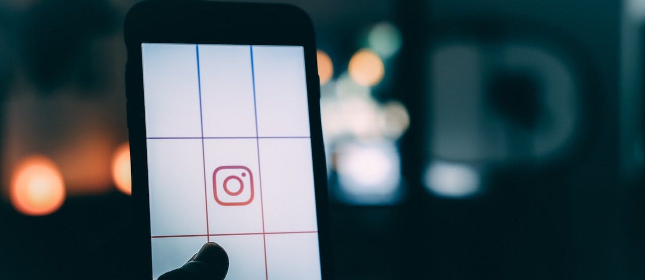 Close up of Instagram icon on mobile screen