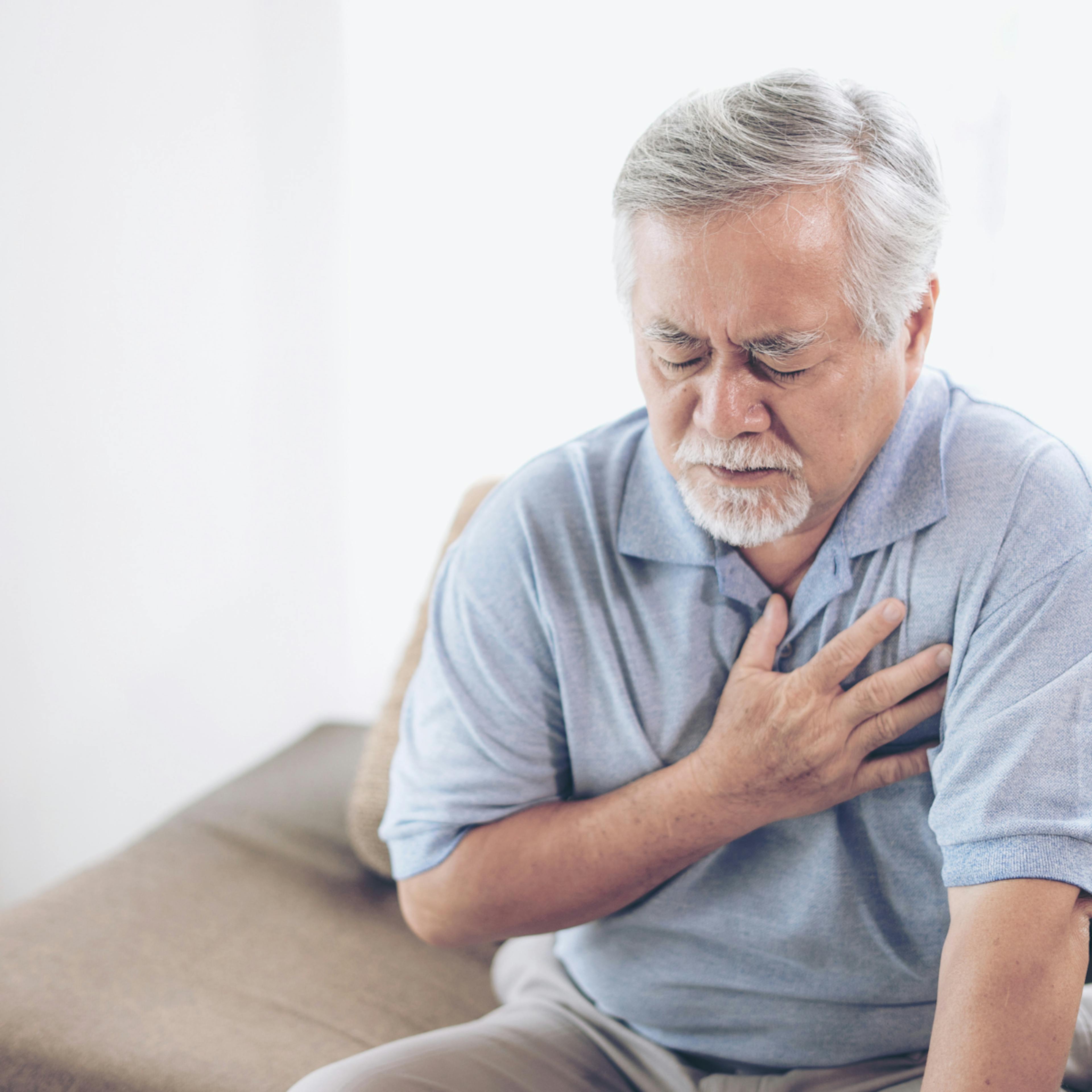 A senior male suffering from pain in his chest