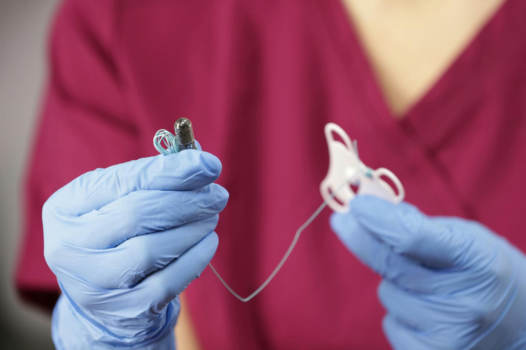 Woman holding a capsule sponge test