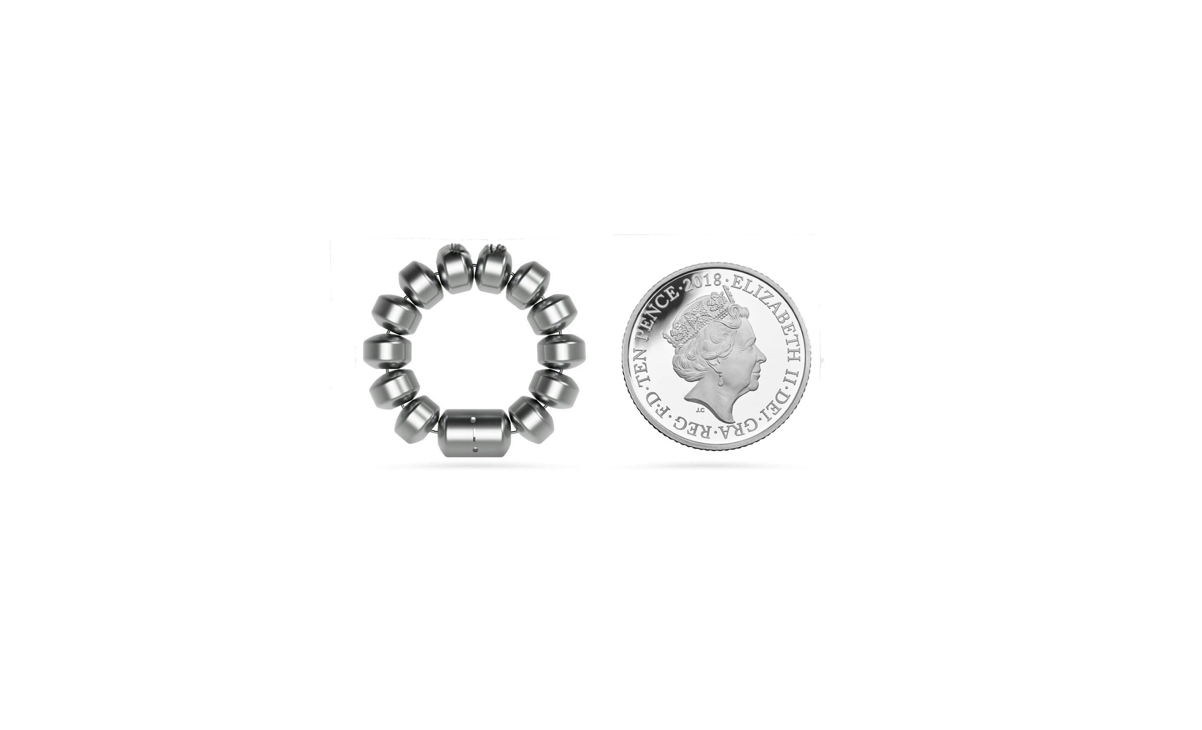 linx device showing comparable size to a ten penny piece