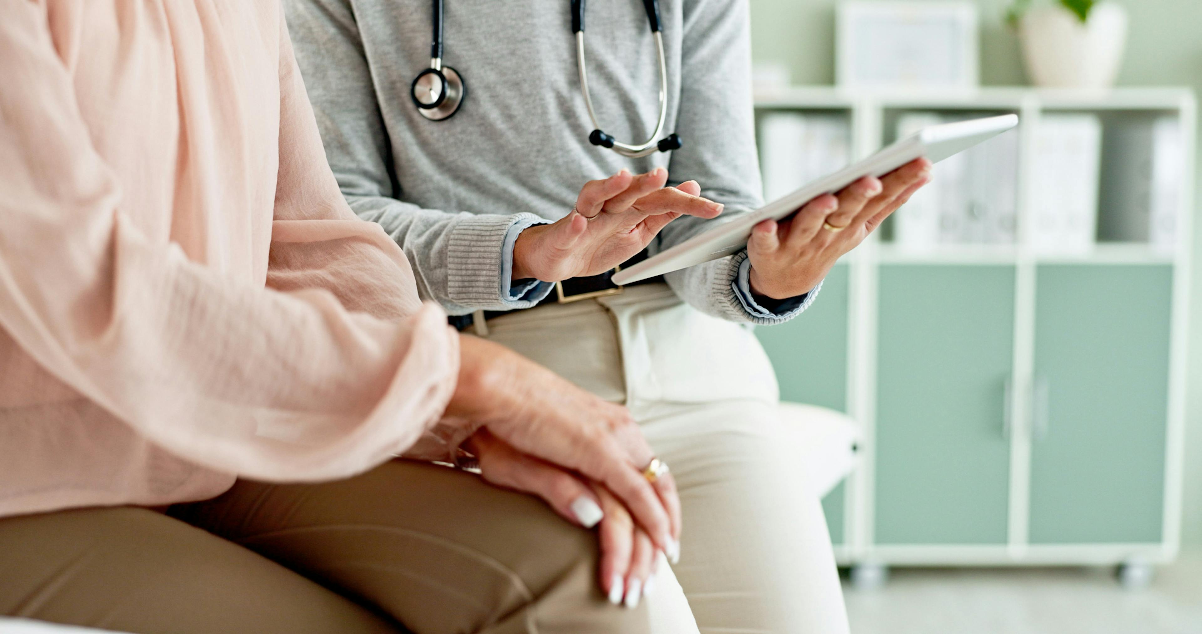 consultant discussing with patient