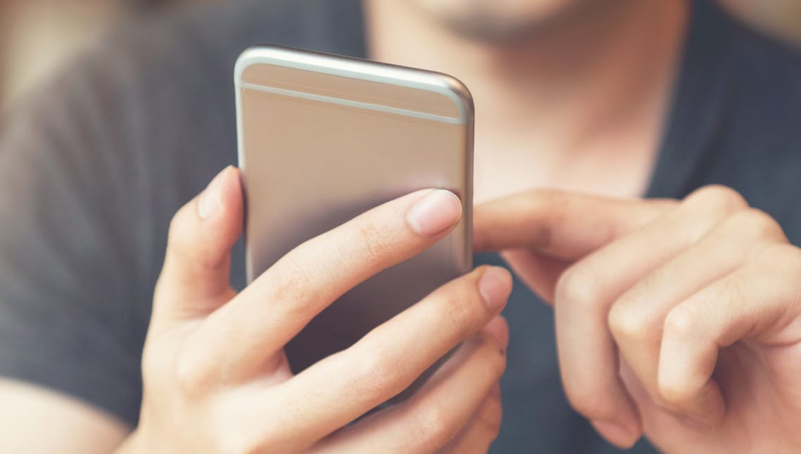 man using a mobile phone