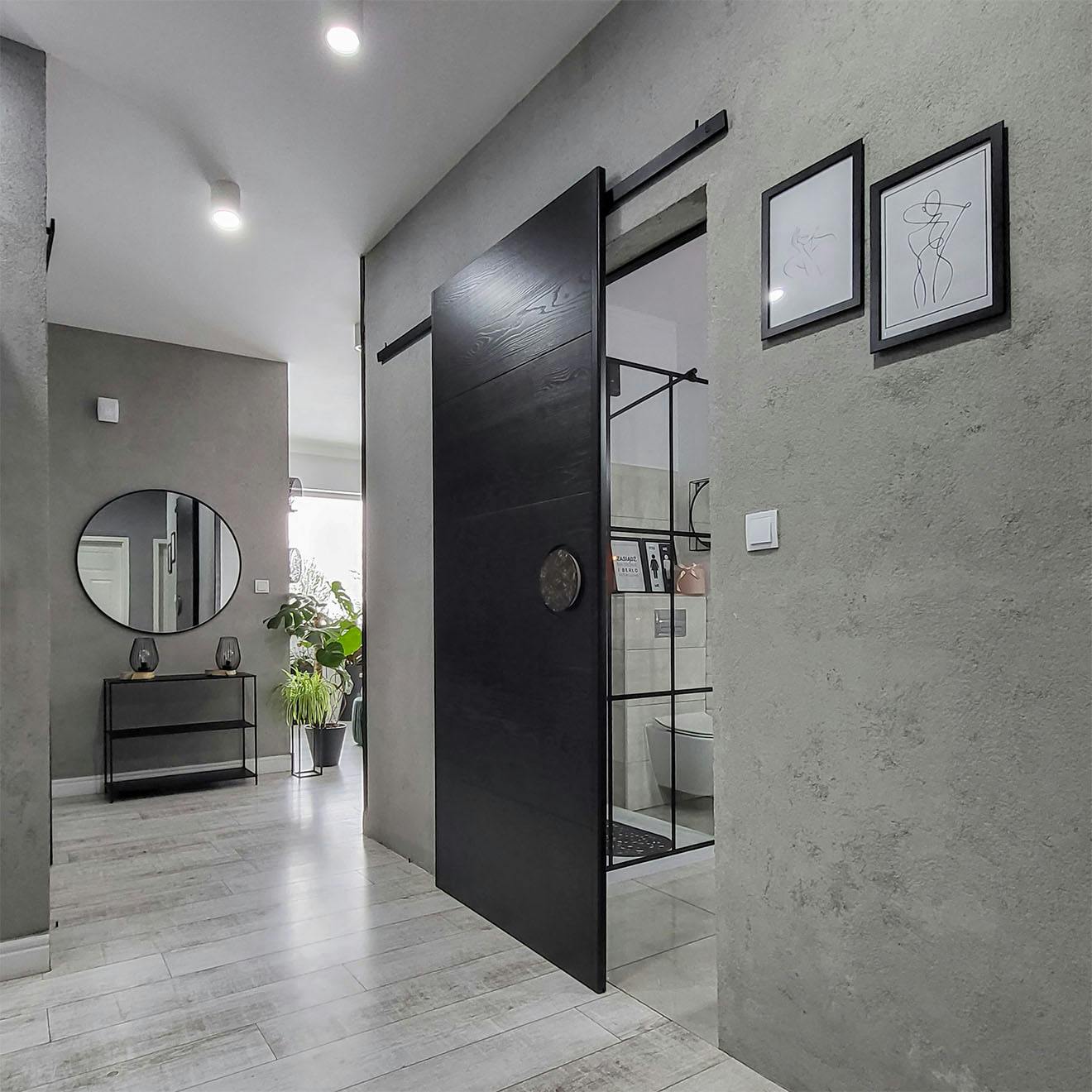 White and gray bathroom with black accessories | RENO doors, image size:1320x1320