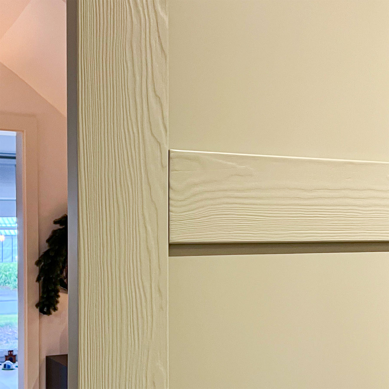 drewniane drzwi przesuwne w kolorze szałwiowej zieleni