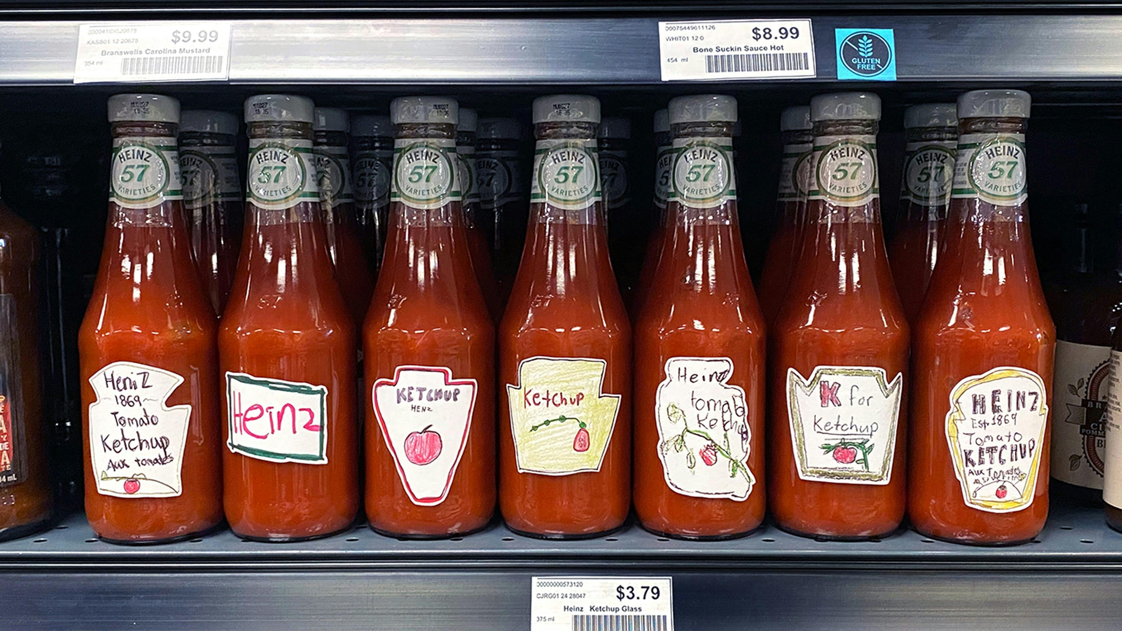 Heinz ketchup bottles on the shelf.