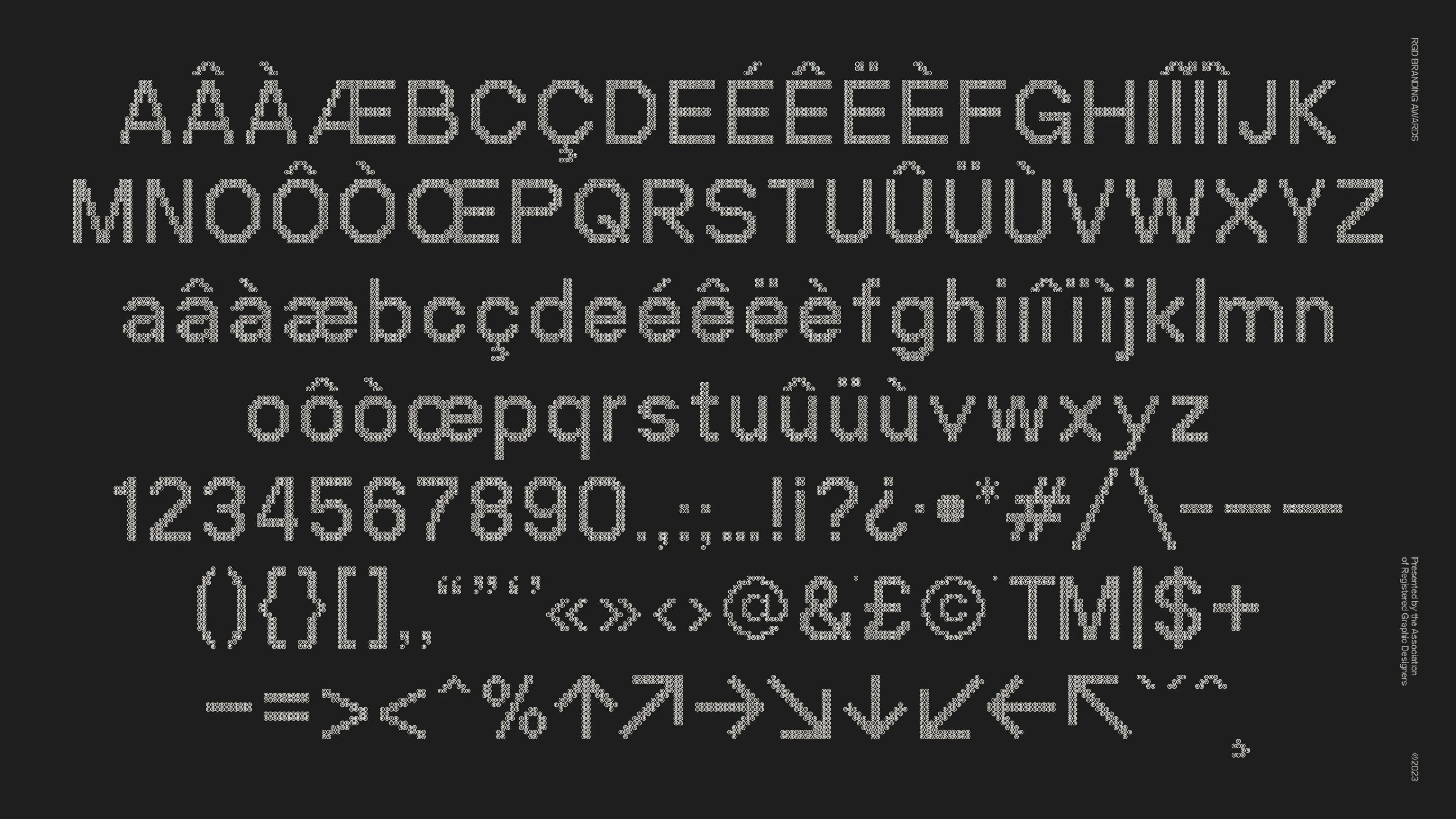 Pixelated alphanumeric characters made out of registered trademark symbols in various cases and accents are displayed on a dark background, showcasing a digital typeface.