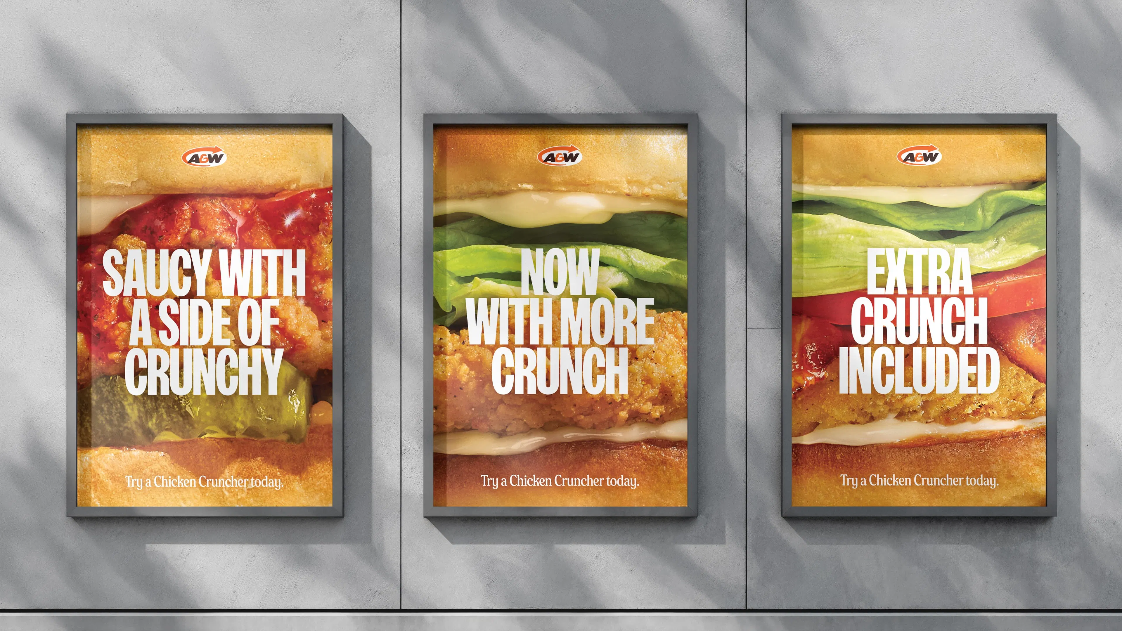 Three posters featuring close-ups of crispy chicken sandwiches with the A&W logo and three headlines in bold white letters.