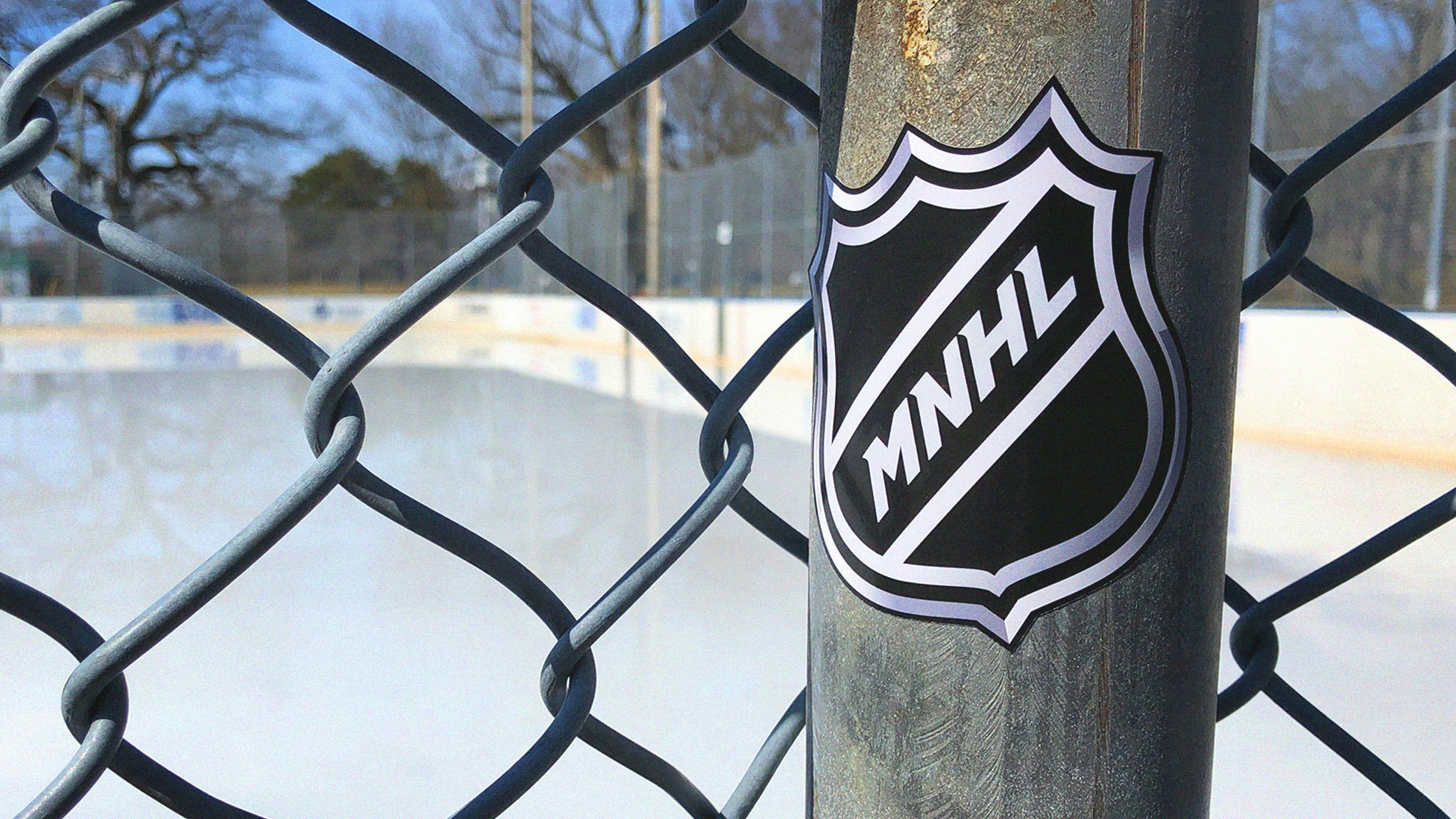 MNHL sticker on a post.