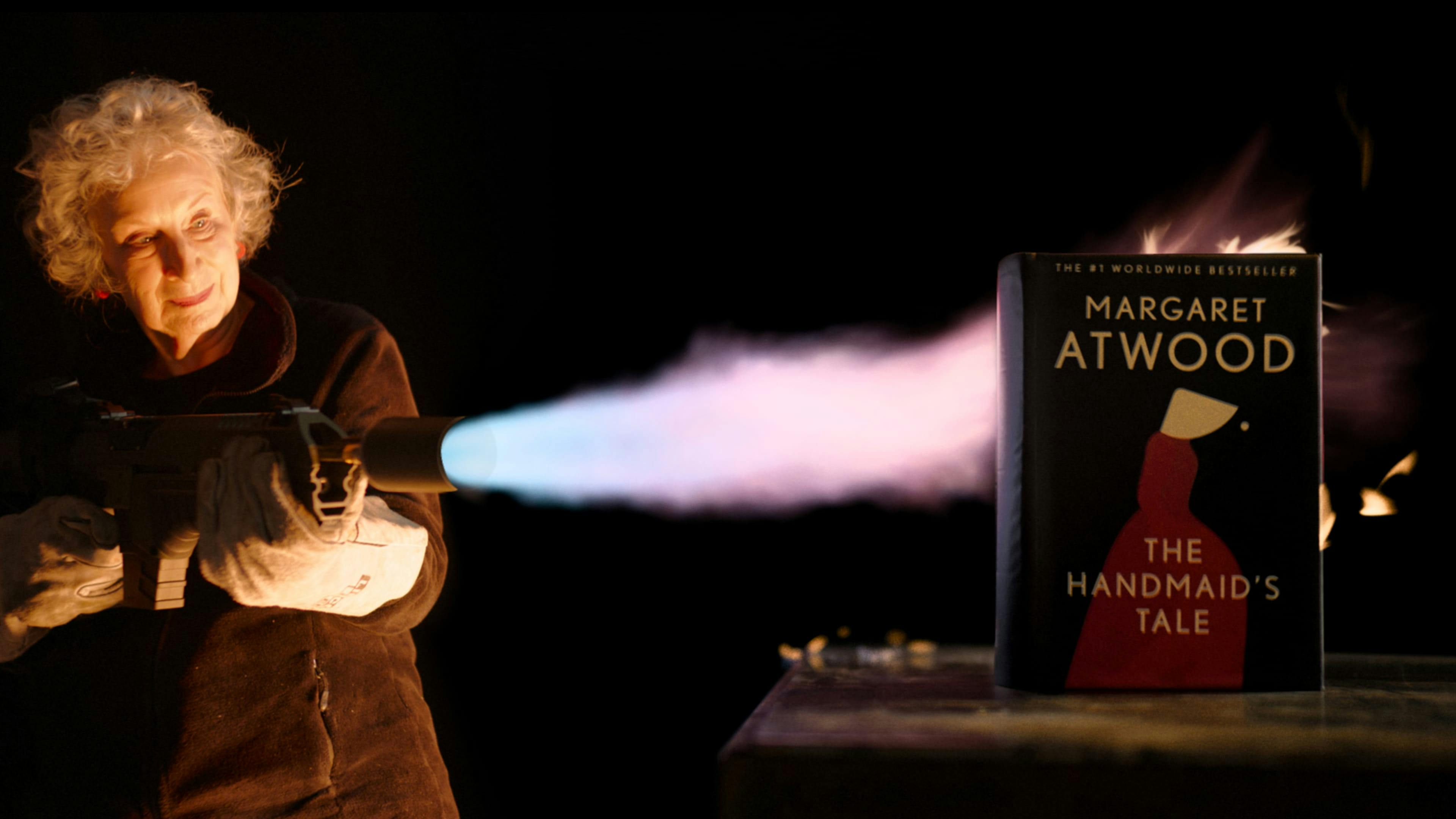 Margaret Atwood using blow torch on The Unburnable Book.