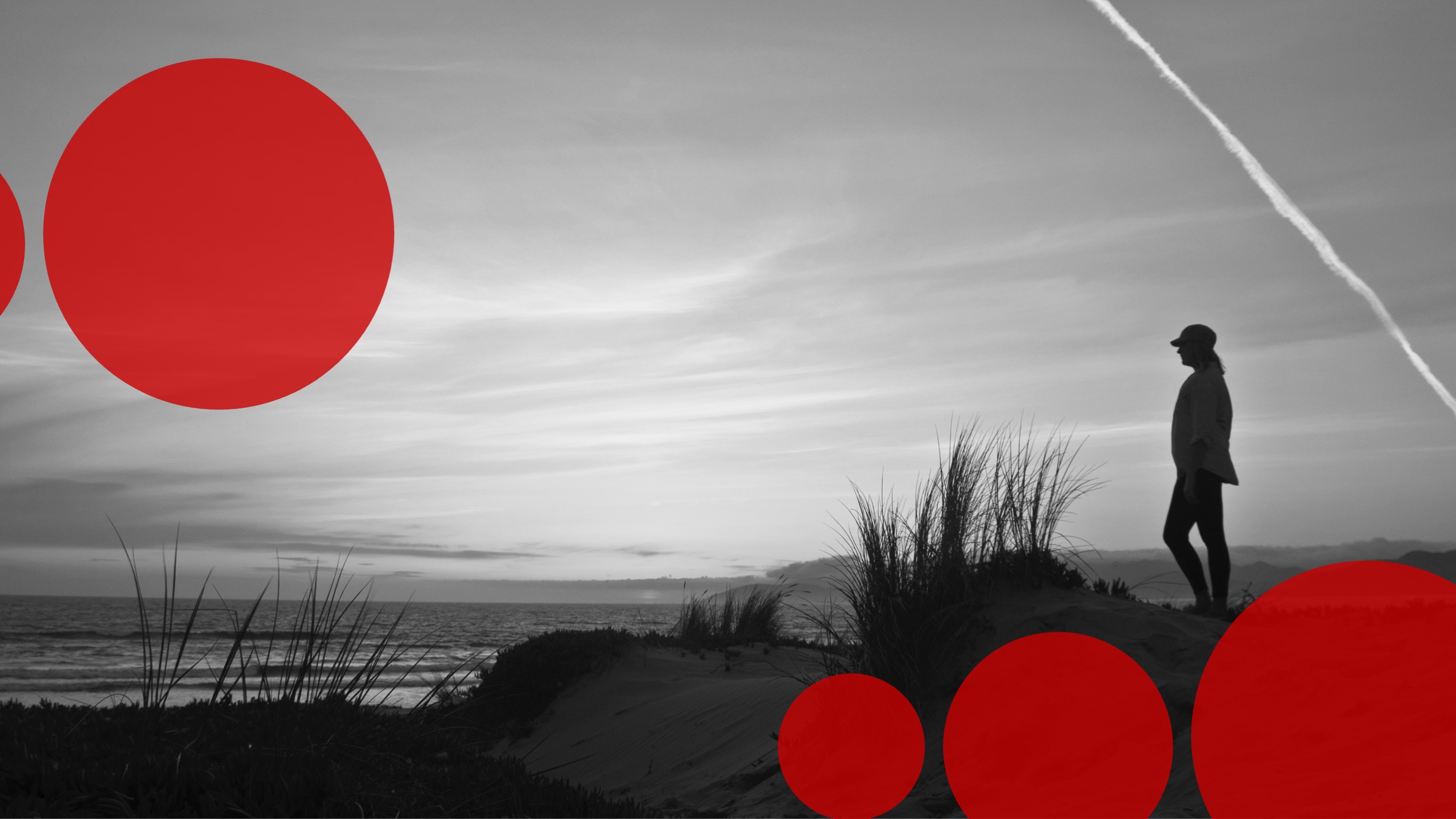 Silhouette von einer Person, die an einer Klippe über einer weitläufigen Landschaft steht. Darunter das Return Logo.