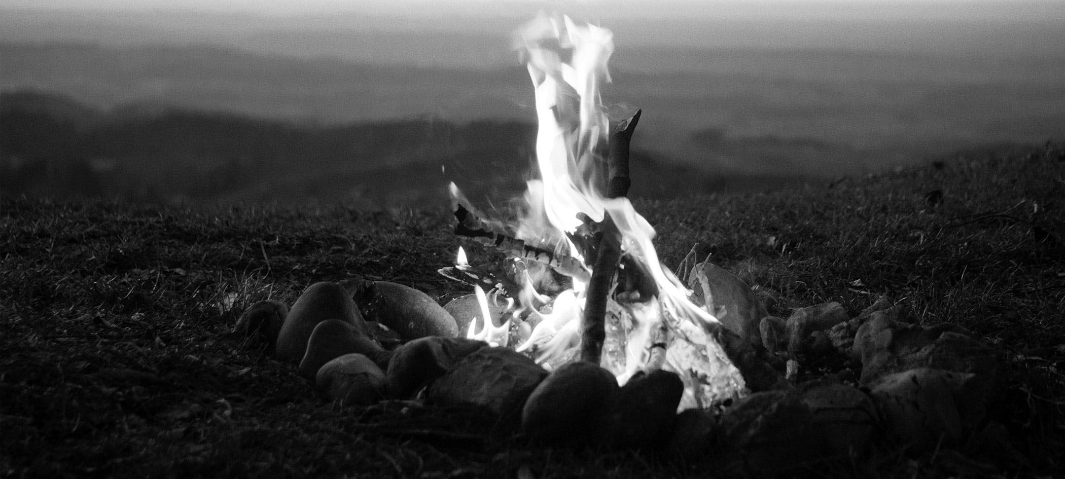 Campfire overlooking sunset