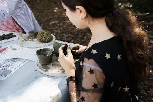 Child working with clay