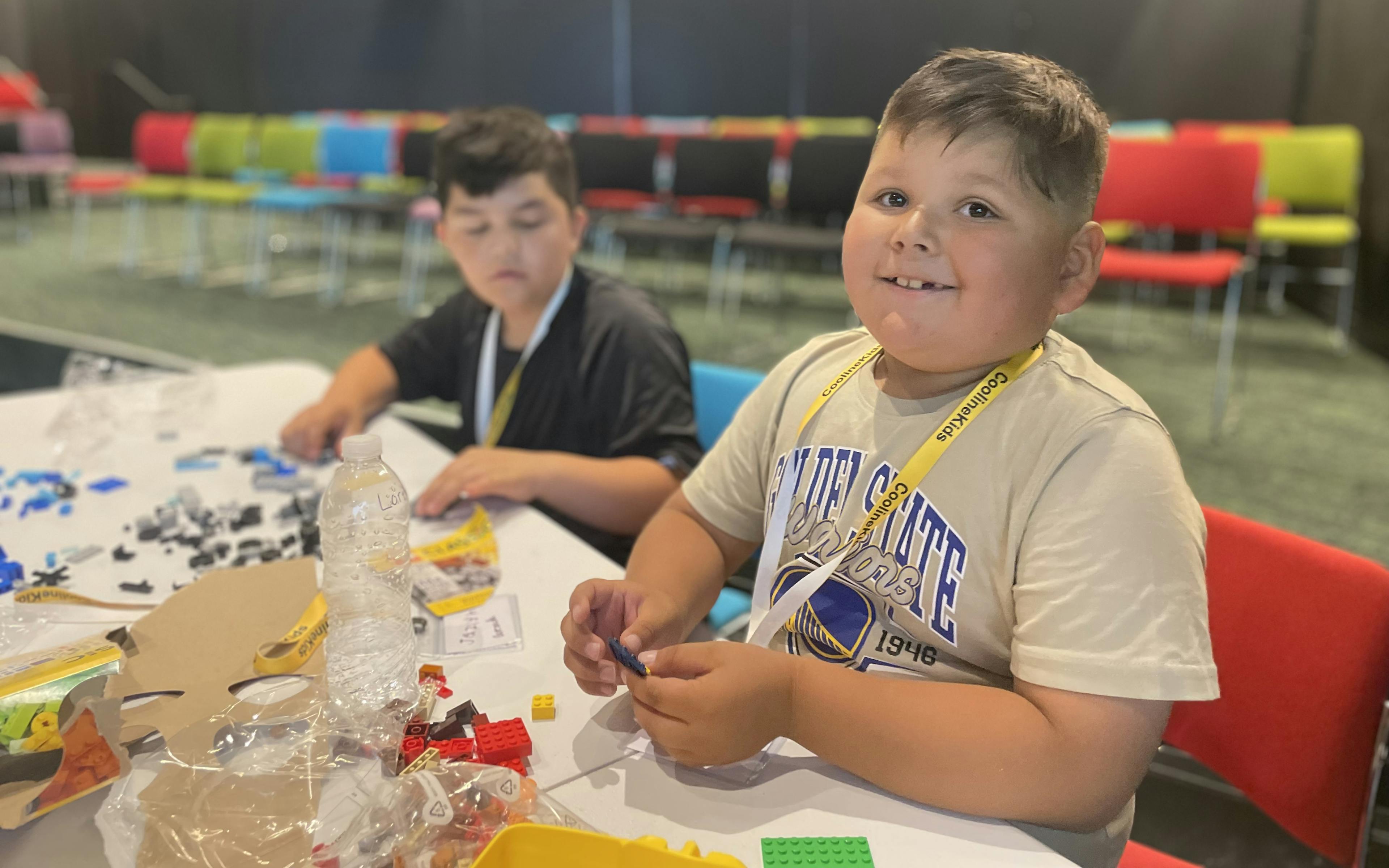 Students building with legos