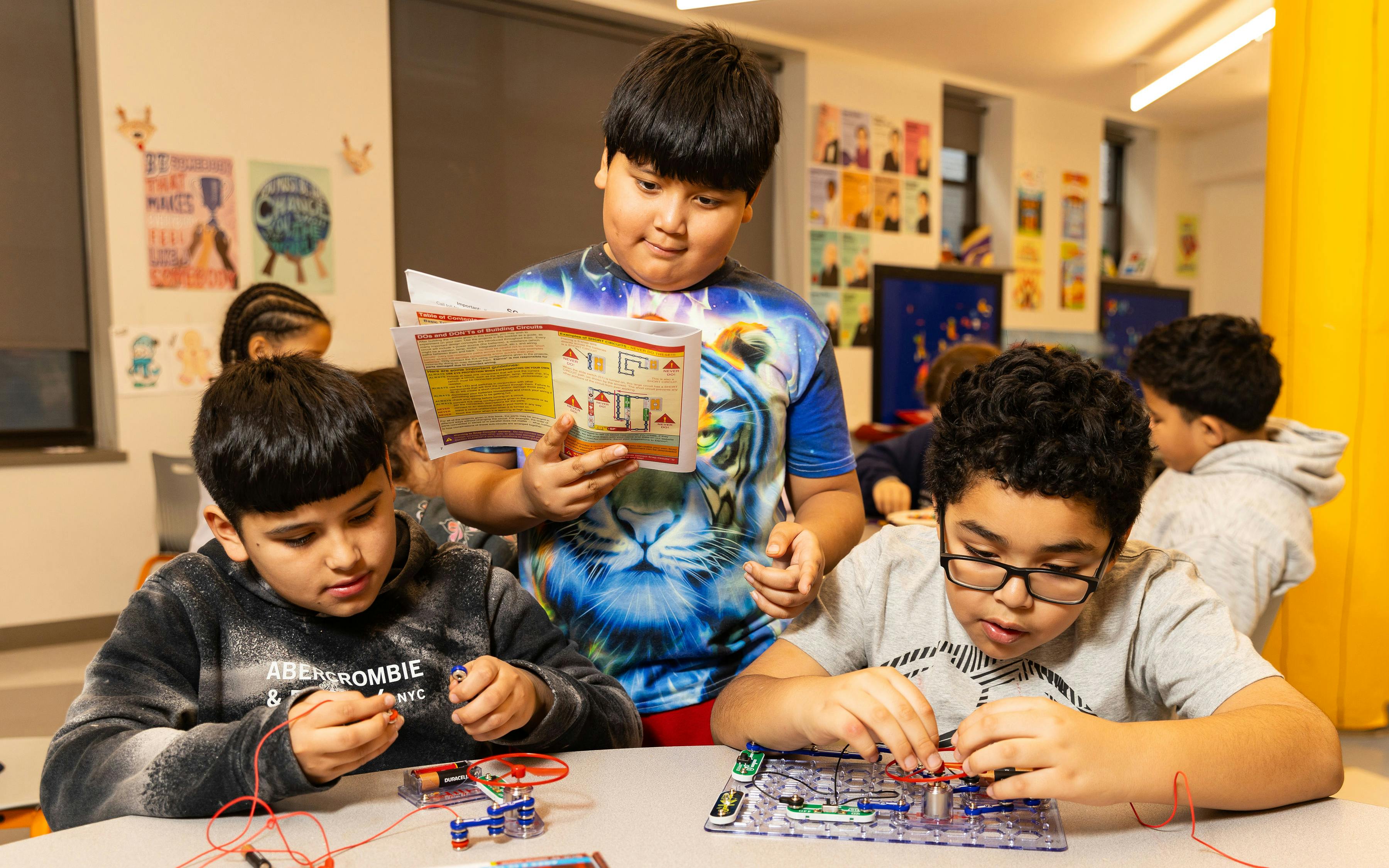 students completing a robotics lesson activity