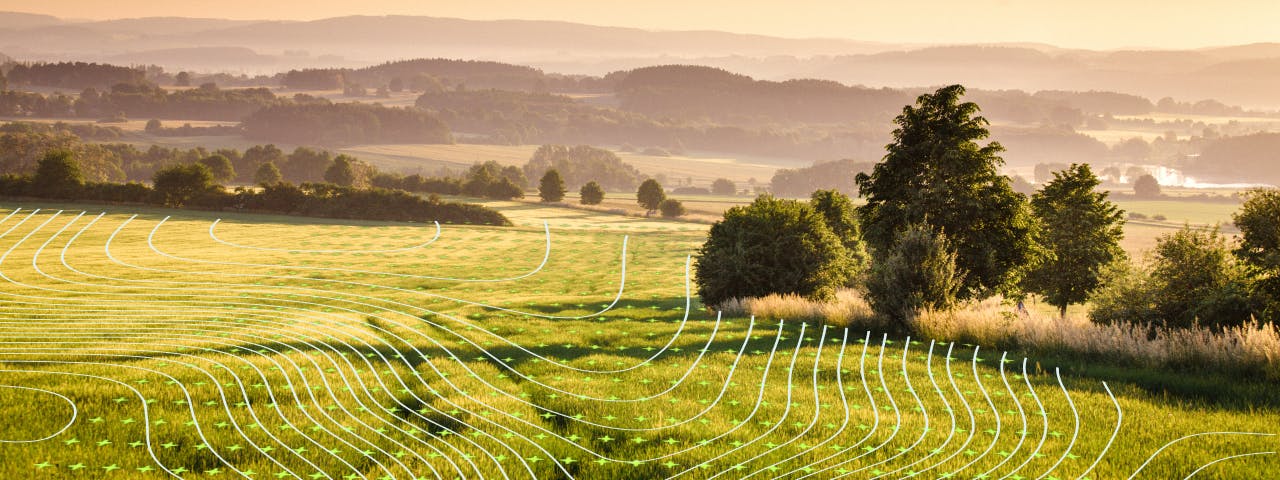 Keylines and remote sensing design features overlaying a Mediterranean landscape.