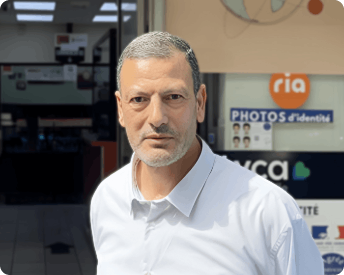 Ria agent standing in front of store