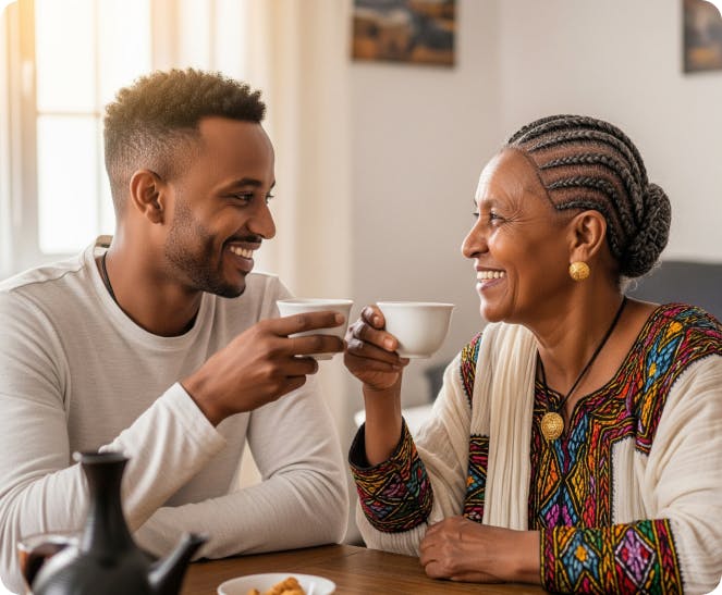 Ethiopian mother and son enjoying coffee
