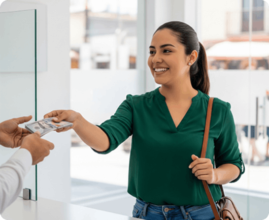 Recipient picking up cash at a Ria location