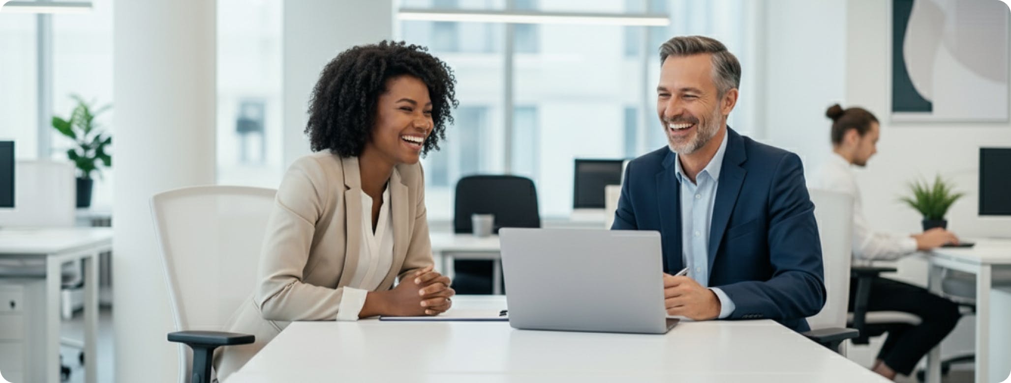 Woman and man collaborating in an office