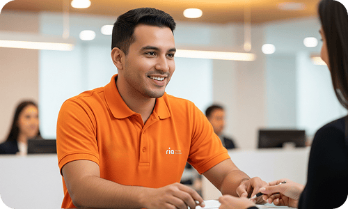 Ria agent handing out cash pickup.