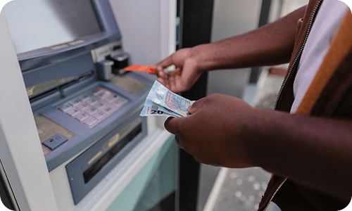 Man withdrawing cash from an ATM