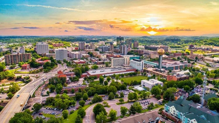 High up view of Knoxville TN with a beautiful sunset in the background