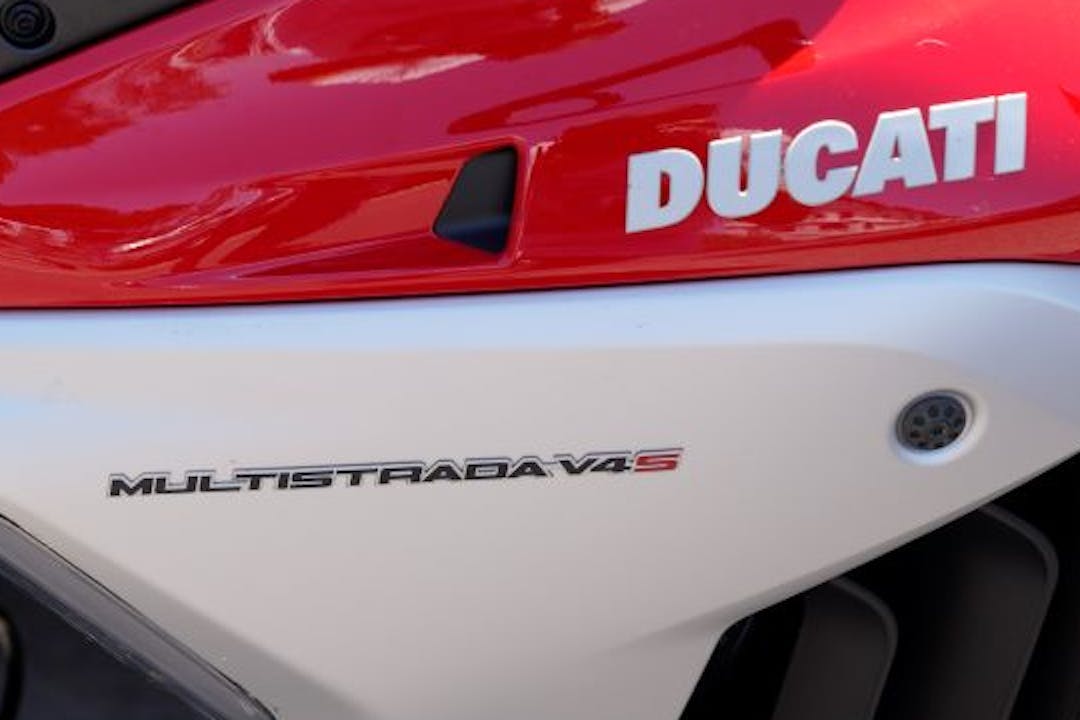 Close up of front of motorcycle guide and specifications for the new 2024 ducati multistrada v4 s grand tour 