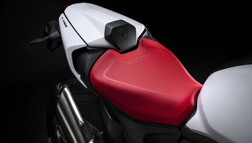 close up of the seat of a 2024 ducati monster plus guide and specifications for the new 2024 ducati monster plus motorcycle