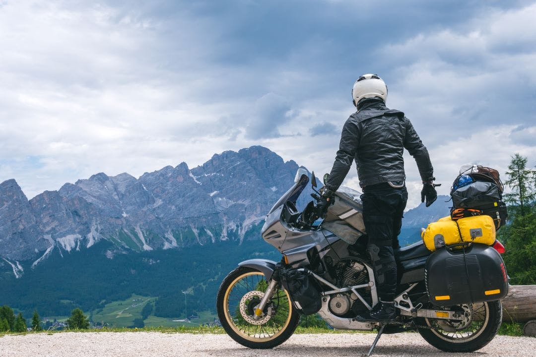 motorcycle rider on motorcycle loaded for a long trip motorcycle touring guide
