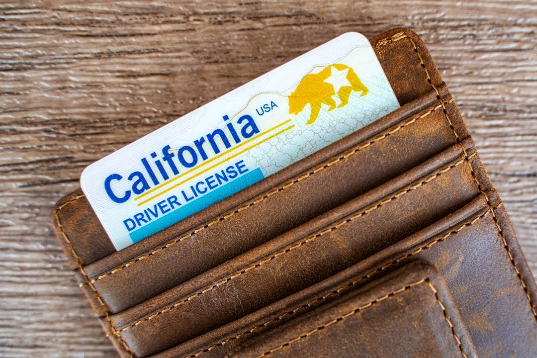 picture of a wallet with a california drivers license motorcycle laws in california