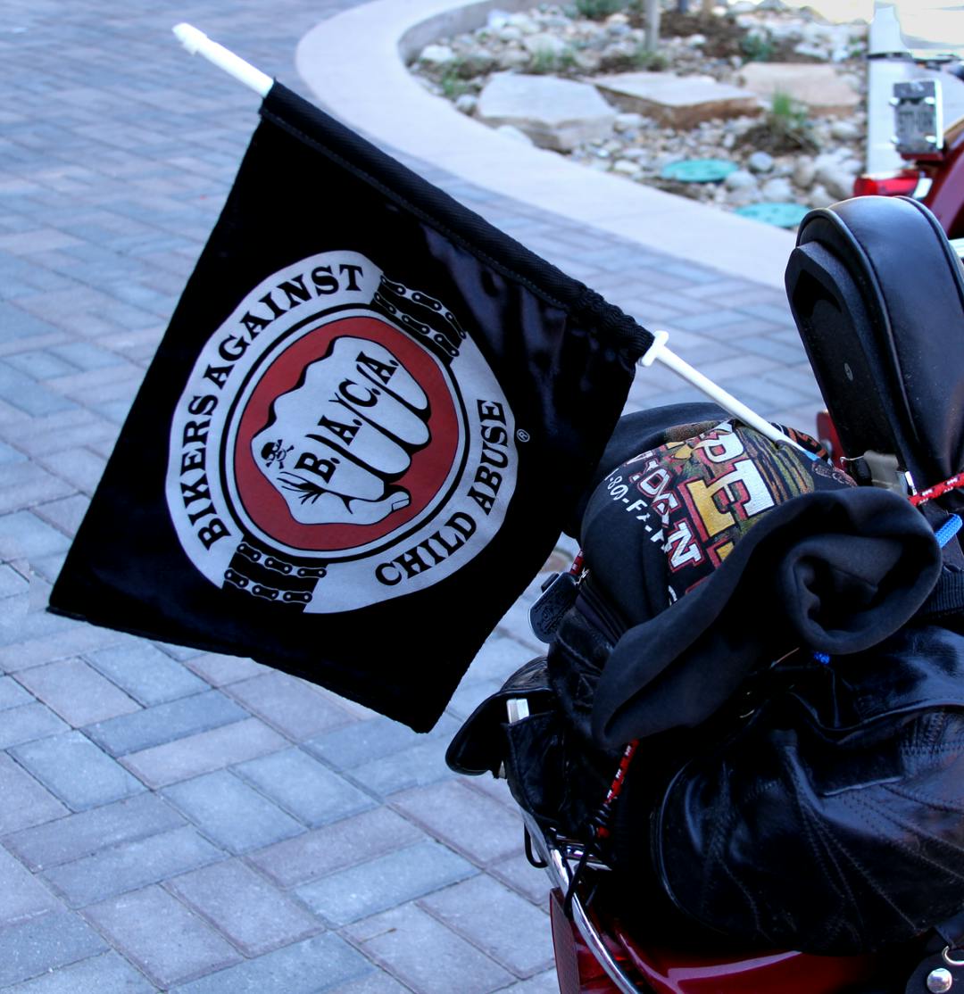 picture of the bikers against child abuse flag on the back of a motorcycle las vegas motorcycle clubs and meetups