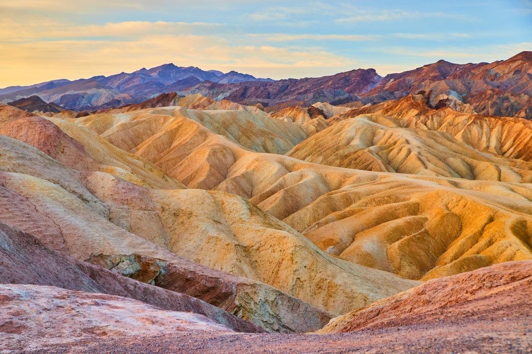 scenic picture of a view looking out over zabriskie point road trip from las vegas to death valley