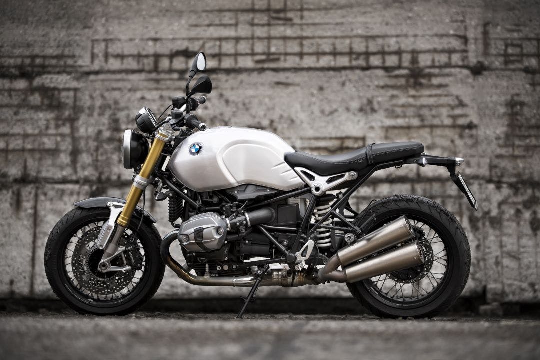 picture of white bmw motorcycle parked in front of a wall do bmw motorcycles hold their value