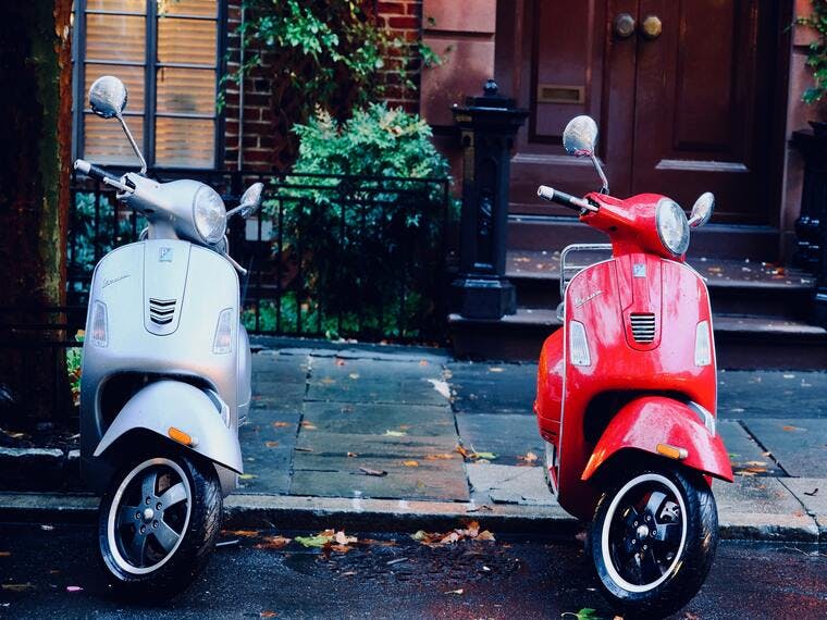 Vespa scooters parked in New Jersey.
