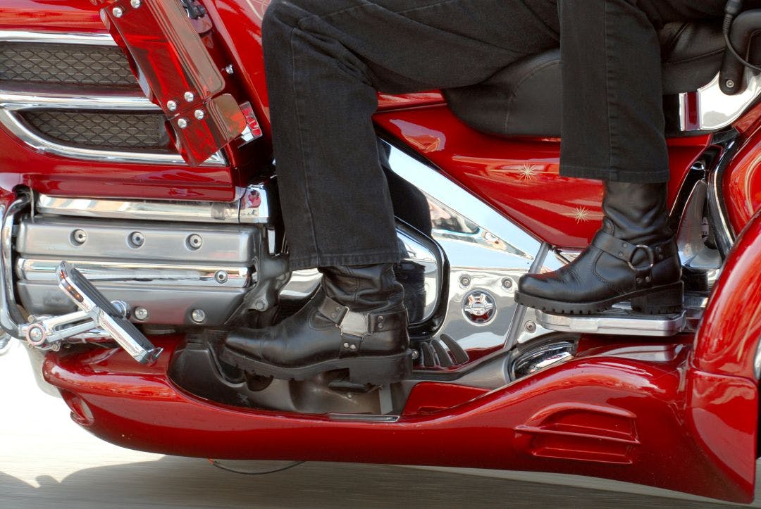 The side view of two motorcyclists footwear Essential Florida Riding Gear for the State’s Unique Climate