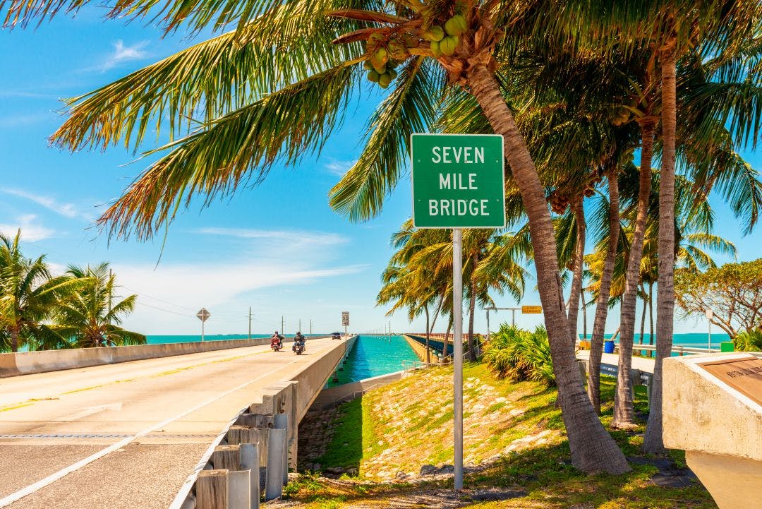 Entrance Sign to Seven Mile Bridge Florida Keys USA Essential Florida Riding Gear for the State’s Unique Climate