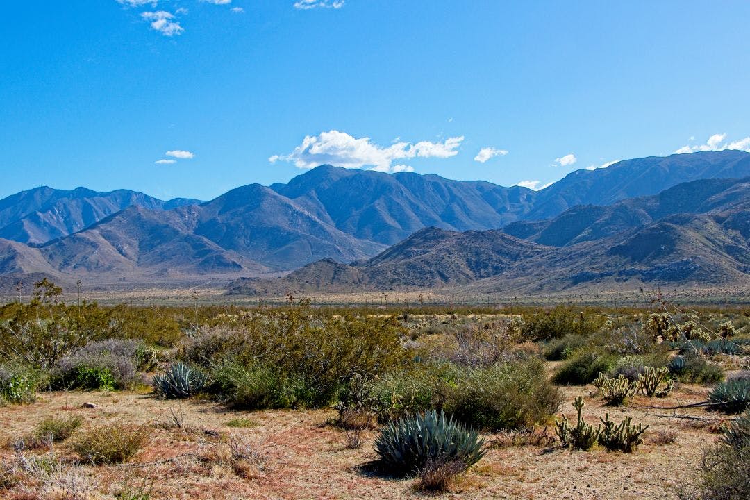 Rugged mountains rise above the desert valleys of Anza-Borrego Desert State Park in San Diego, California Experience a Palm Springs to San Diego Road Trip