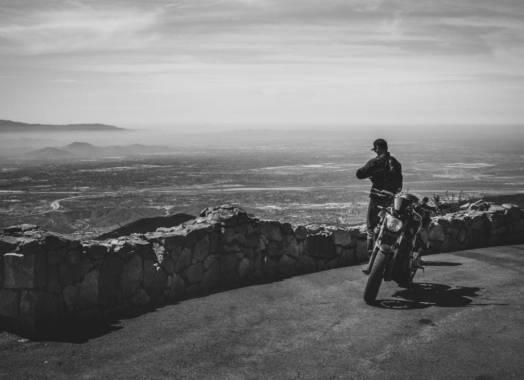 Man taking in the view Your Guide to Palm Springs by Motorcycle