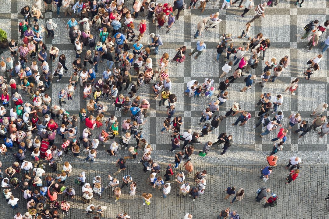 large group of people gathered at the street How to Meet New People in the Motorcycle Community