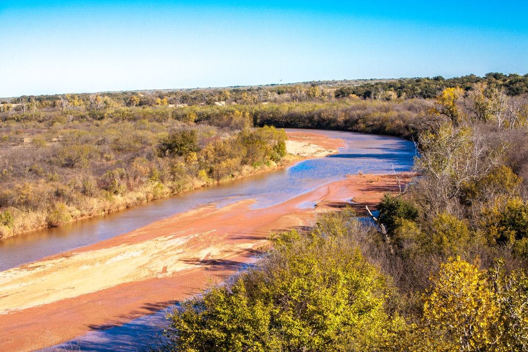 The red river in central Texas. The Red River, or sometimes the Red River of the South, is a major tributary of the Mississippi The Ultimate Guide to Motorcycle Riding in Dallas