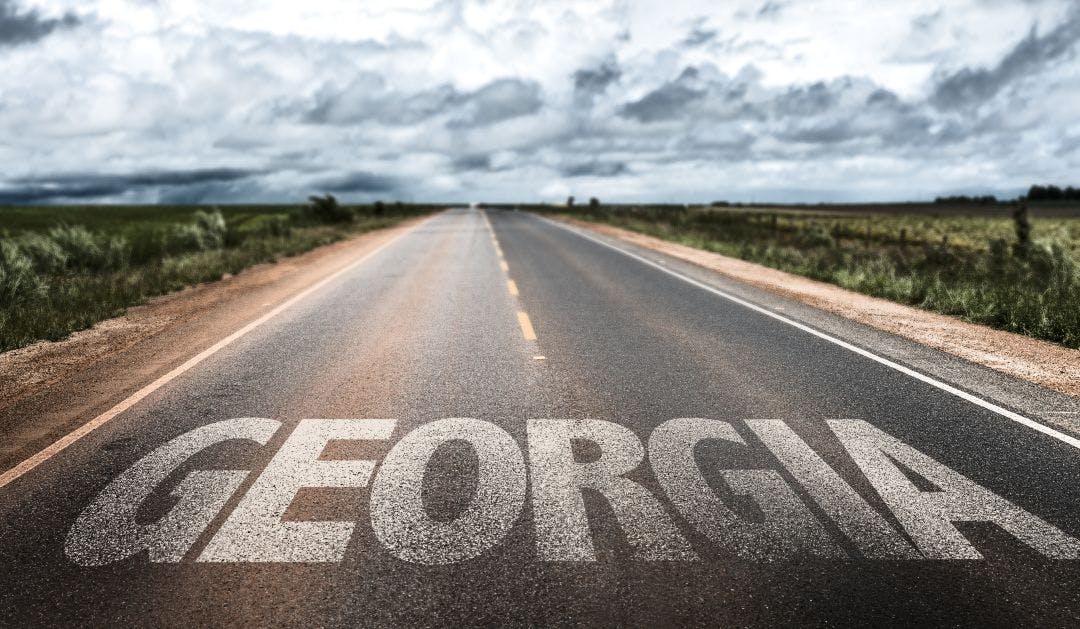 Georgia written on the road What are Georgia's Motorcycle Laws?