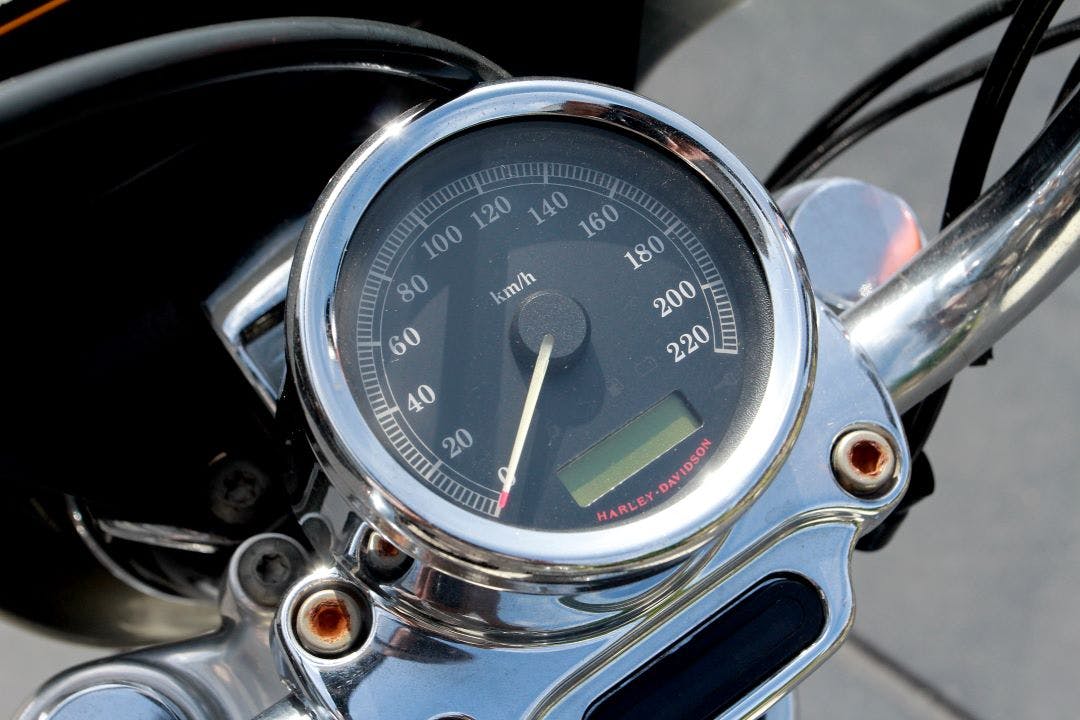 close up of Harley speedometer and odometer What's High Mileage for a Harley-Davidson Motorcycle?