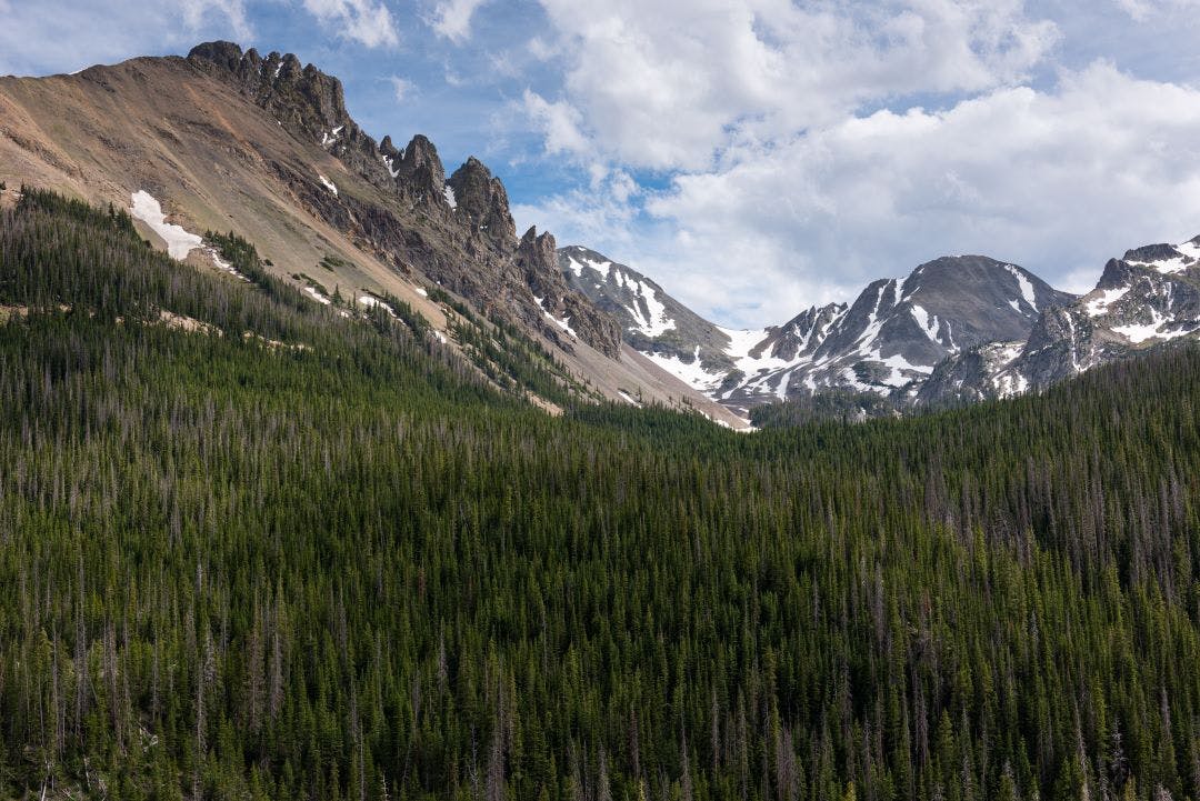 The Nokhu Crags is a picturesque formation that can be viewed from Highway 14 or the Cache la Poudre Scenic Byway in Northern Colorado Best Motorcycle Roads in Colorado