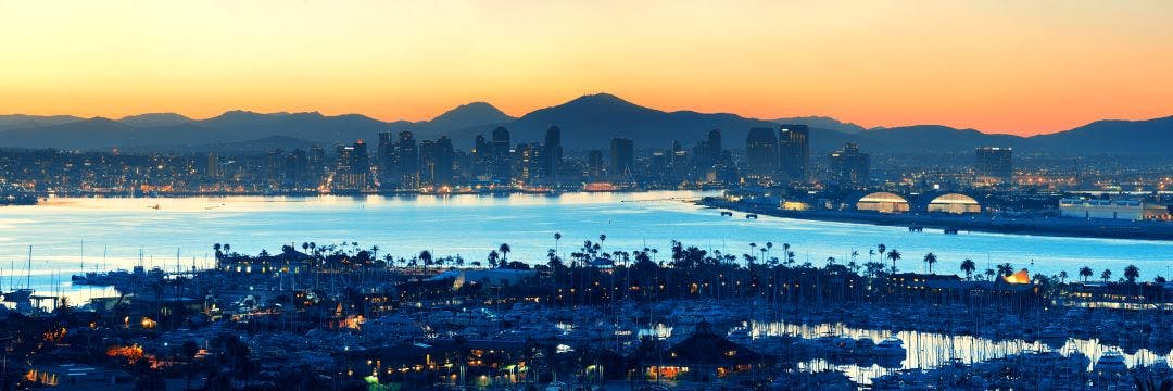 downtown san diego with mountains in background Is San Diego Motorcycle Friendly? Your Next Riding Destination.